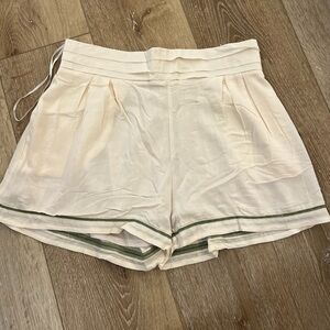 Coveted Clothing Cream Shorts with Green Trim